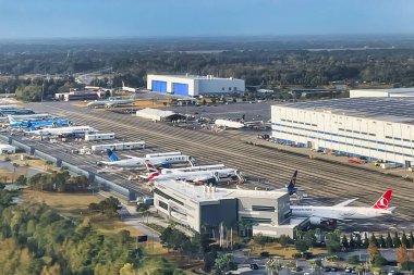 charleston, united states - 05 november 2022: an aerial view of a boeing plant in South carolina with planes parked outside clipart