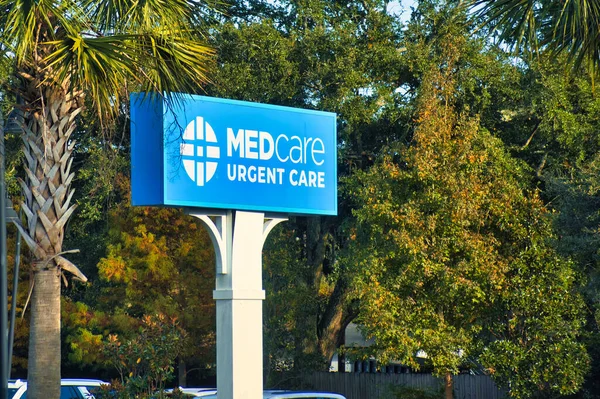 stock image charleston, united states - november 5 2022: a road sign outside an urgent care facility of medcare