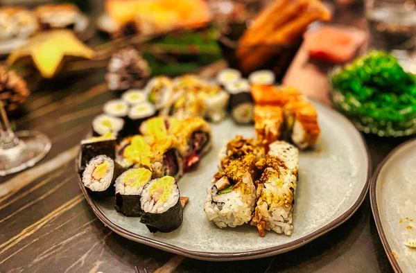 Dish Festively Decorated Table Japanese Sushi Rolls Raw Fish — Stock Photo, Image