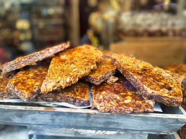 annecy, france - january 5 2023: home made colorful chocolate bars on display in a store