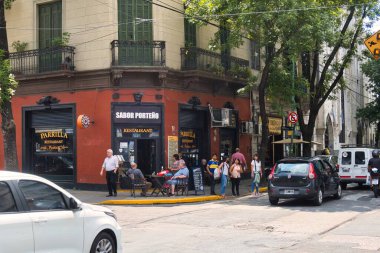 buenos aires, argentina - 29 October 2022 : tourists walking around the colorful and popular la boca neighborhood with shops and stores