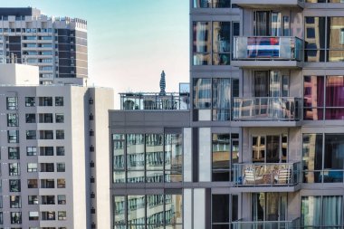toronto, canada - 24 October 2022: concrete big real estate apartment building in the city with a garden around