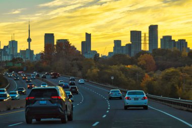 toronto, canada - 23 October 2022: cars driving in a traffic jam on a highway or parkway into the city