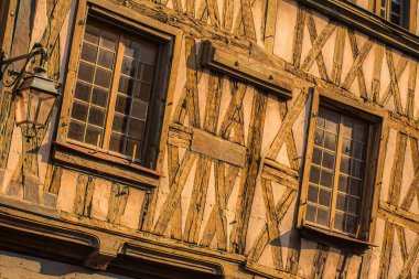 Auxerre, France - March 05 2014 : The authentic building style of the bourgondy is ever present. Wood and stone in combination clipart