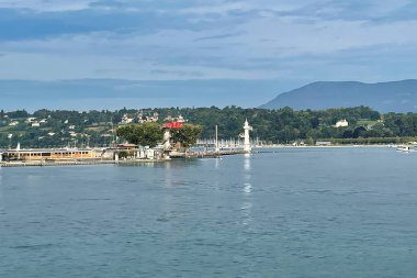 Geneva, Switzerland - September 14 2021: the paquis beach is one of the best known recreational beaches of the city on a summer day clipart