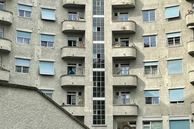 Geneva, Switzerland - September 15 2021: a classic architectural building in pre bauhaus style with apartments made of concrete on the rue charles-giron clipart