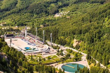 Almaty, Kazakhstan - june 17 2017 : the ski and ice skating resort of shymbulak within the zailiyskiy alatau mountain range. the ice skating stadium was the most important of the soviet union