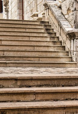 Annecy, France - September 21 2020 : street view of an historic medieval french town with architectural facades and elegant entrance staircases of stone clipart