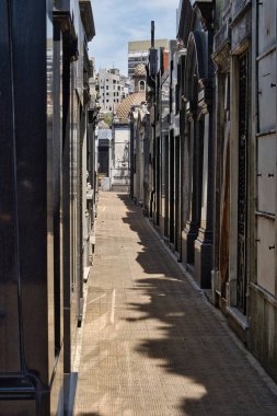 buenos aires, argentina - 28 October 2022: close up of one of the world famous landmark the La Recoleta cemetery with historic monumental graves with sculptures an architectural wonder clipart