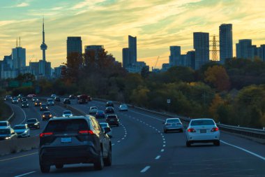 toronto, canada - 23 October 2022: cars driving in a traffic jam on a highway or parkway into the city