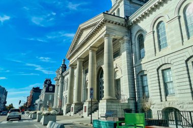 kingston, canada - 23 October 2022: columns at the entrance facade of the historic architectural city hall building of the city clipart