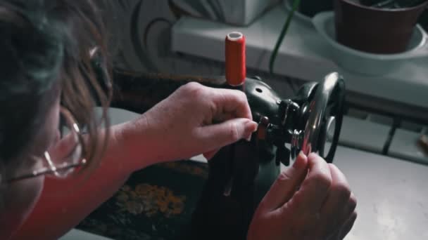 Woman Winds Thread Sewing Typewriter Close Elderly Woman Glasses Sews — Wideo stockowe