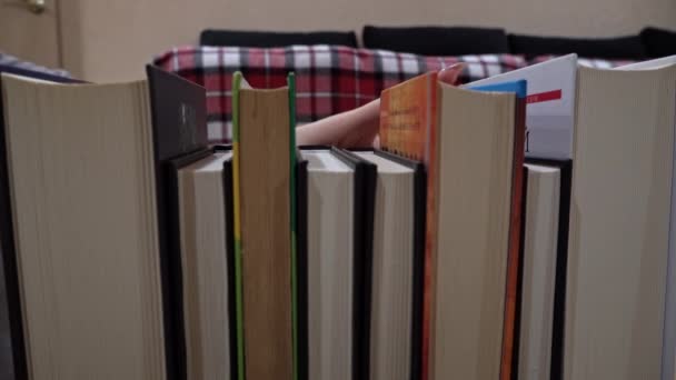 Young Girl Chooses Book Shelf Books Library Bookshelves Background Stack — Video