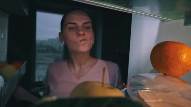 Beautiful Cheerful Young Woman Opens Refrigerator Food Takes Apple View — Stock Video