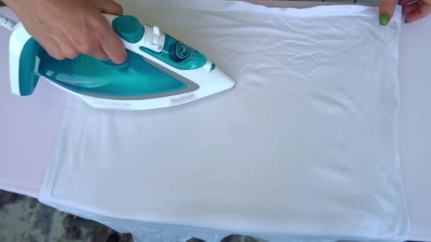 Iron Emits Steam Slow Young Woman Irons Clothes Ironing Board — Stock Video