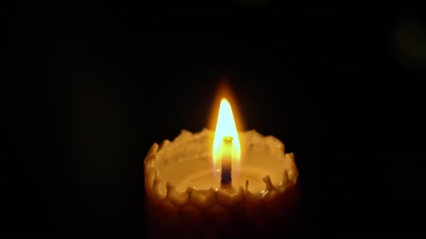Wax Candle Burns Black Background Candle Lights Yellow Lights Large — Stock Video