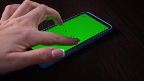 Woman Uses Smartphone Green Screen Chromatic Key Browse Social Networks — Stock Video