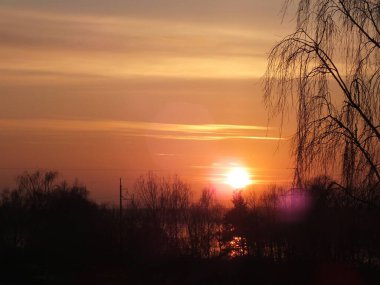 February sunset in Riga's Bolderaja microdistrict. clipart