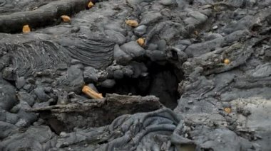 4K close-up footage of Cold Lava in Fagradalsfjall active volcano in Geldingadalir, Reykjanes, Iceland. River of Cold Lava Flowing down the hill.
