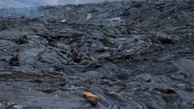 4K close-up footage of Cold Lava in Fagradalsfjall active volcano in Geldingadalir, Reykjanes, Iceland. River of Cold Lava Flowing down the hill.