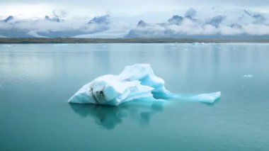 Jokulsarlon glacier Lagoon, Iceland. Stunning icebergs floating in lagoon, powerful message of climate change in Iceland. Perfect light and weather. High quality 4k footage.