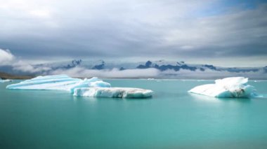 Jokulsarlon glacier Lagoon, Iceland. Stunning icebergs floating in lagoon, powerful message of climate change in Iceland. Perfect light and weather. High quality 4k footage.