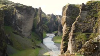 Fjadragljufur in Iceland. Stunning view of River canyon, steep rock walls. High quality 4k footage