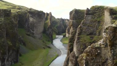 Fjadragljufur in Iceland. Stunning view of River canyon, steep rock walls. High quality 4k footage