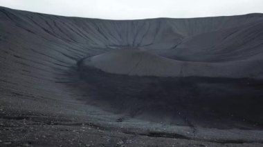 Aerial drone footage of an inactive Hverfjall volcano, Iceland. Cinematic aerial view of Hverfjall crater, a dormant volcano in Iceland. High quality 4k footage