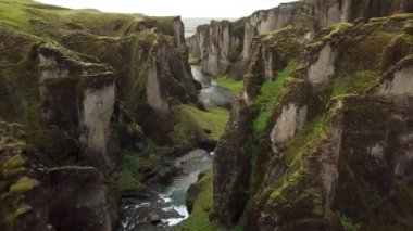 Aerial drone footage of Fjadrargljufur Canyon in Iceland. Stunning view of river canyon and landscape In South East Iceland. High quality 4k footage