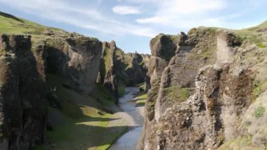 Fjadragljufur in Iceland. Stunning view of River canyon, steep rock walls. High quality 4k footage