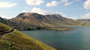 Iceland landscape with stunning mountains around Landmannalaugar. Iceland nature in a dramatic weather. Moss covered lava fields in Iceland. High quality 4k footage