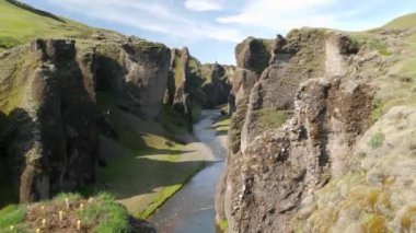 Fjadragljufur in Iceland. Stunning view of River canyon, steep rock walls. High quality 4k footage