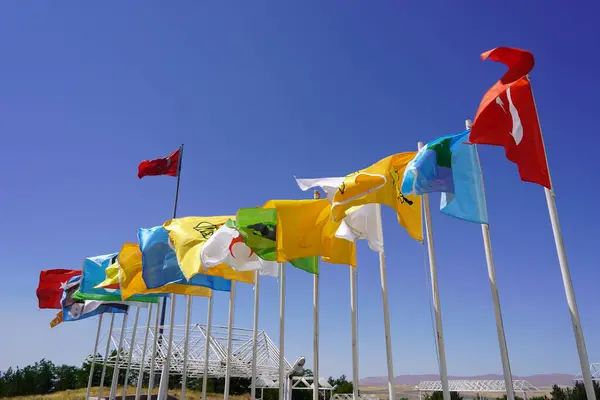 stock image Flags of 16 Turkish states under the deep blue sky: Flags of 16 Turkish States behind the Great Turkish Flag, Unity and Diversity