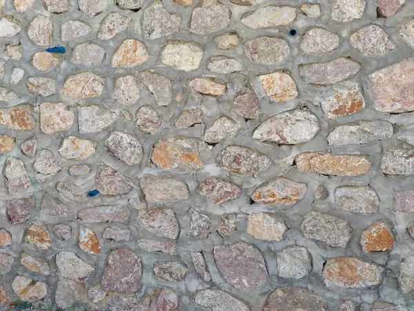 Dayanıklılık: Bir Metaforik Taş Duvar Dayanıklılık ve Uyum, Her Eşsiz Kaya 'nın Havan Tarafından Bağlanan Kişiliği temsil ettiği, Çeşitlilikte Birliğin Gücünü Sembolize Ettiği.
