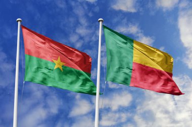 Burkina Faso ve Benin 'in Bayrakları Mavi Gökyüzüne Karşı Birlikte Dalgalanıyor, Batı Afrika İşbirliği ve Bölgesel İlişkileri sembolize ediyor