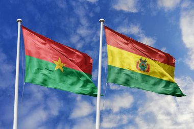 Bir Burkina Faso ve Bolivya bayrağı, Güney Amerika-Afrika birliği için bir metafor, mavi gökyüzüne karşı el sallayarak dostluğu ve kültürel değişimi simgeliyor..