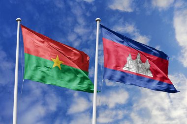 Bir Burkina Faso ve Kamboçya bayrağı, Asya-Afrika birliği için bir metafor, mavi gökyüzüne karşı birlikte dalgalanıyor, dostluğu ve kültürel değişimi simgeliyor.