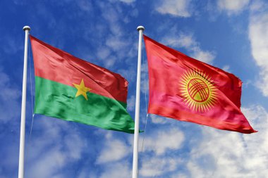 Burkina Faso ve Kırgızistan 'ın Bayrakları Mavi Gökyüzüne Karşı Birlikte Dalgalanıyor, Diplomatik İlişkileri ve Küresel Bağlantıları Sembolize Ediyor