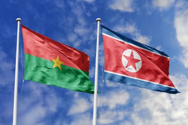 Burkina Faso ve Kuzey Kore 'nin Bayrakları Mavi Gökyüzüne Karşı Birlikte Dalgalanıyor, Diplomatik İlişkiler ve Uluslararası İlişkileri simgeliyor