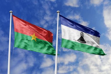 Burkina Faso ve Lesotho 'nun bayrakları uçsuz bucaksız gökyüzünün altında yan yana dalgalanıyor, birlik, kültürel uyum ve karşılıklı saygıyı simgeliyor..
