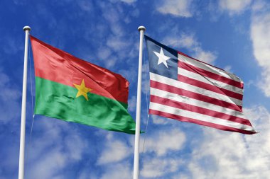 Burkina Faso ve Liberya 'nın Bayrakları Mavi Gökyüzüne Karşı Birlikte Dalgalanıyor, İkili İlişkiler ve Batı Afrika Bağlantılarını simgeliyor
