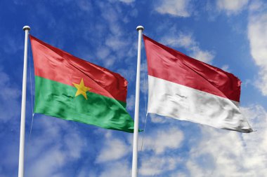 Asya-Afrika birliği için bir metafor olan Burkina Faso ve Endonezya bayrağı, mavi gökyüzüne karşı el sallayarak dostluğu ve kültürel değişimi sembolize ediyor..