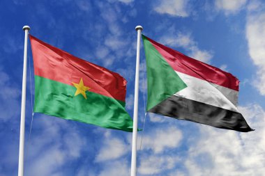 Bir Burkina Faso ve Sudan bayrağı, Doğu Afrika dayanışması için bir metafor, mavi gökyüzüne karşı birlikte el sallayarak dostluğu ve kültürel değişimi simgeliyor..