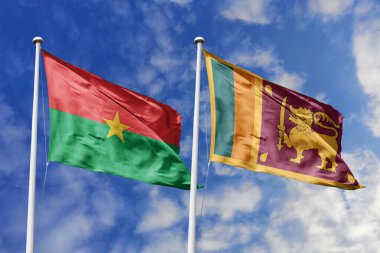 Asya-Afrika birliği için bir metafor olan Burkina Faso ve Sri Lanka bayrağı, mavi gökyüzüne karşı birlikte el sallayarak dostluğu ve kültürel değişimi simgeliyor..