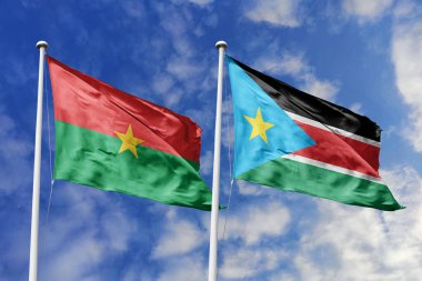 Bir Burkina Faso ve Güney Sudan bayrağı, Doğu Afrika dayanışması için bir metafor, mavi gökyüzüne karşı birlikte el sallayarak dostluğu ve kültürel değişimi simgeliyor..