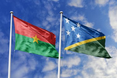 Bir Burkina Faso ve Solomon Adaları bayrağı, Pasifik-Afrika birliği için bir metafor, mavi gökyüzüne karşı birlikte dalgalanıyor, dostluğu ve kültürel değişimi simgeliyor..