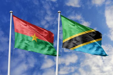 Bir Burkina Faso ve Tanzanya bayrağı, Doğu-Batı Afrika birliği için bir metafor, mavi gökyüzüne karşı el sallayarak dostluğu ve işbirliğini simgeliyor..