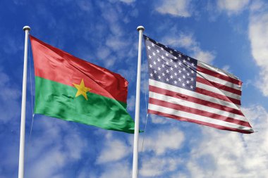 Bir Burkina Faso ve Amerikan bayrağı, Atlantik ötesi işbirliğinin bir metaforu, mavi gökyüzüne karşı birlikte el sallamak, dostluğu ve karşılıklı desteği simgeliyor..