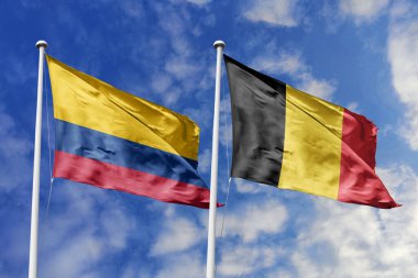 Kolombiya ve Belçika Bayrakları Mavi Gök Altında Uyumlu Dalgalanıyor, İkili İlişkiler ve Avrupa-Güney Amerika İlişkilerini Sembolize Ediyor.